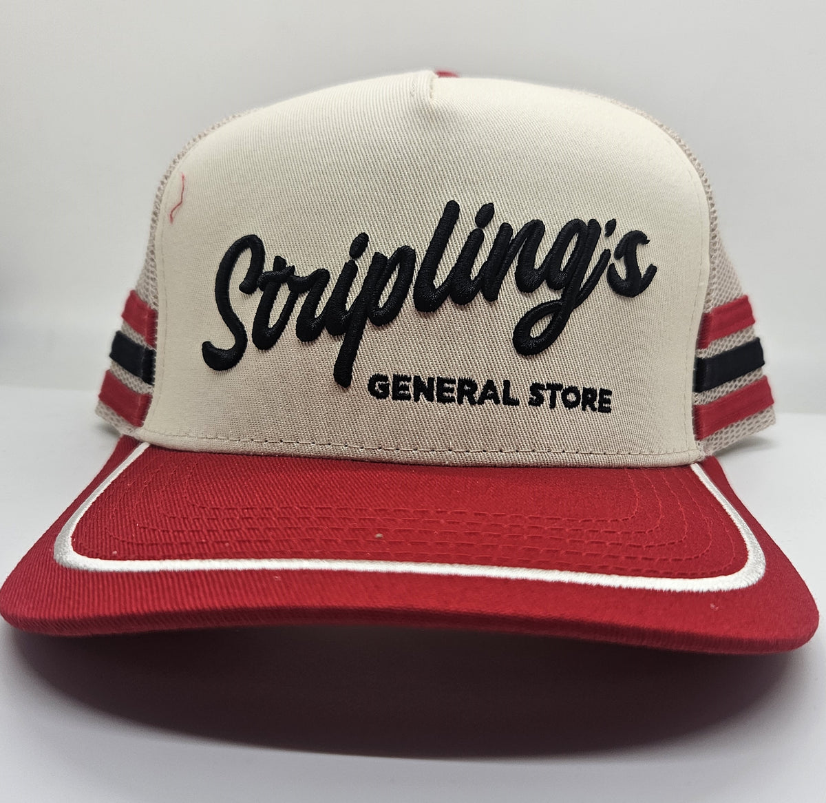 Stripling's red, white and black rope hat with cream front panel and red brim