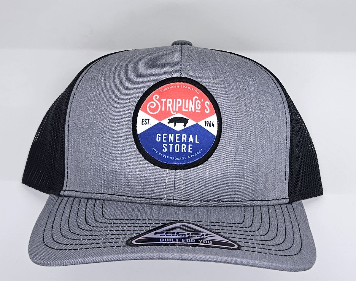 Stripling's grey trucker hat with black mesh and the round red, white and blue Stripling's General Store patch